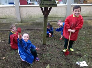 Primary 2 busy in the garden!