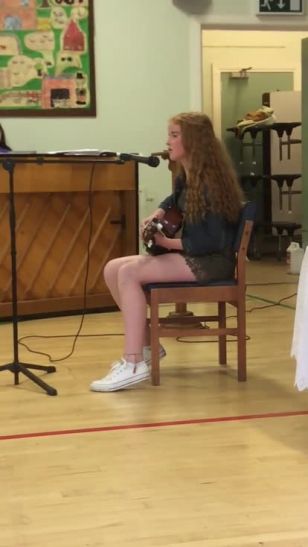 Grace singing at Leavers Prize-giving